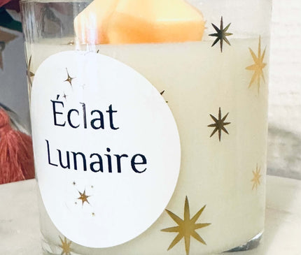 Bougie parfumée Éclat Lunaire aux notes fruitées, florales, ambrées avec paillettes d'or et cire de soja 100% naturelle