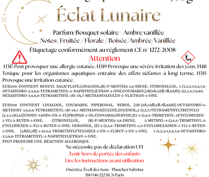 Bougie parfumée Éclat Lunaire aux notes fruitées, florales, ambrées et vanillées dans un contenant en verre avec paillettes d'or.