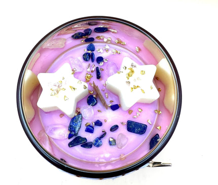 Bougie parfumée Résilience aux notes musquées et boisées dans un contenant en verre réutilisable
